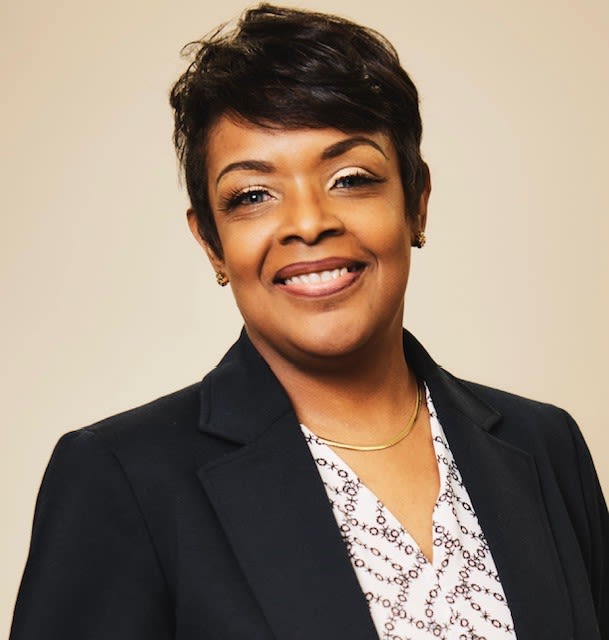Kimberly Logan — Executive Director