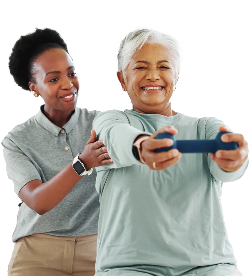 Caregiver assisting senior woman with resistance band exercise