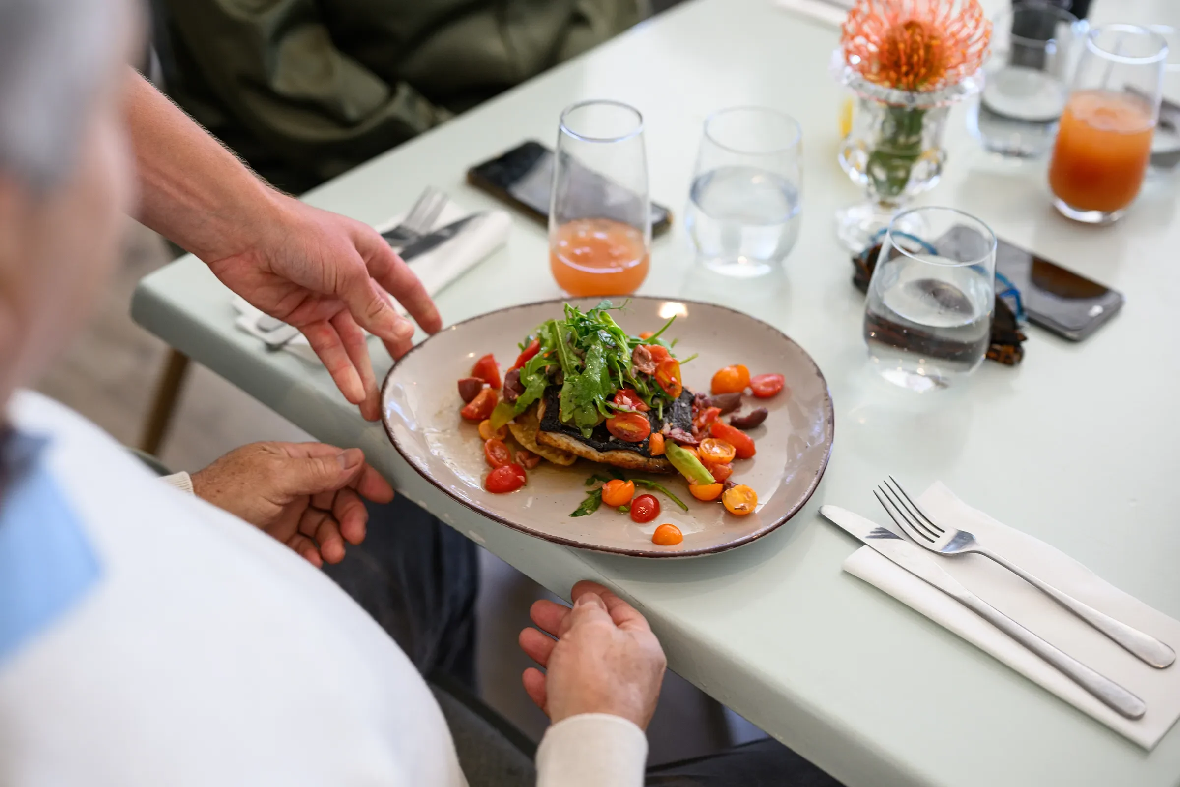 Gourmet toast with arugula and cherry tomatoes